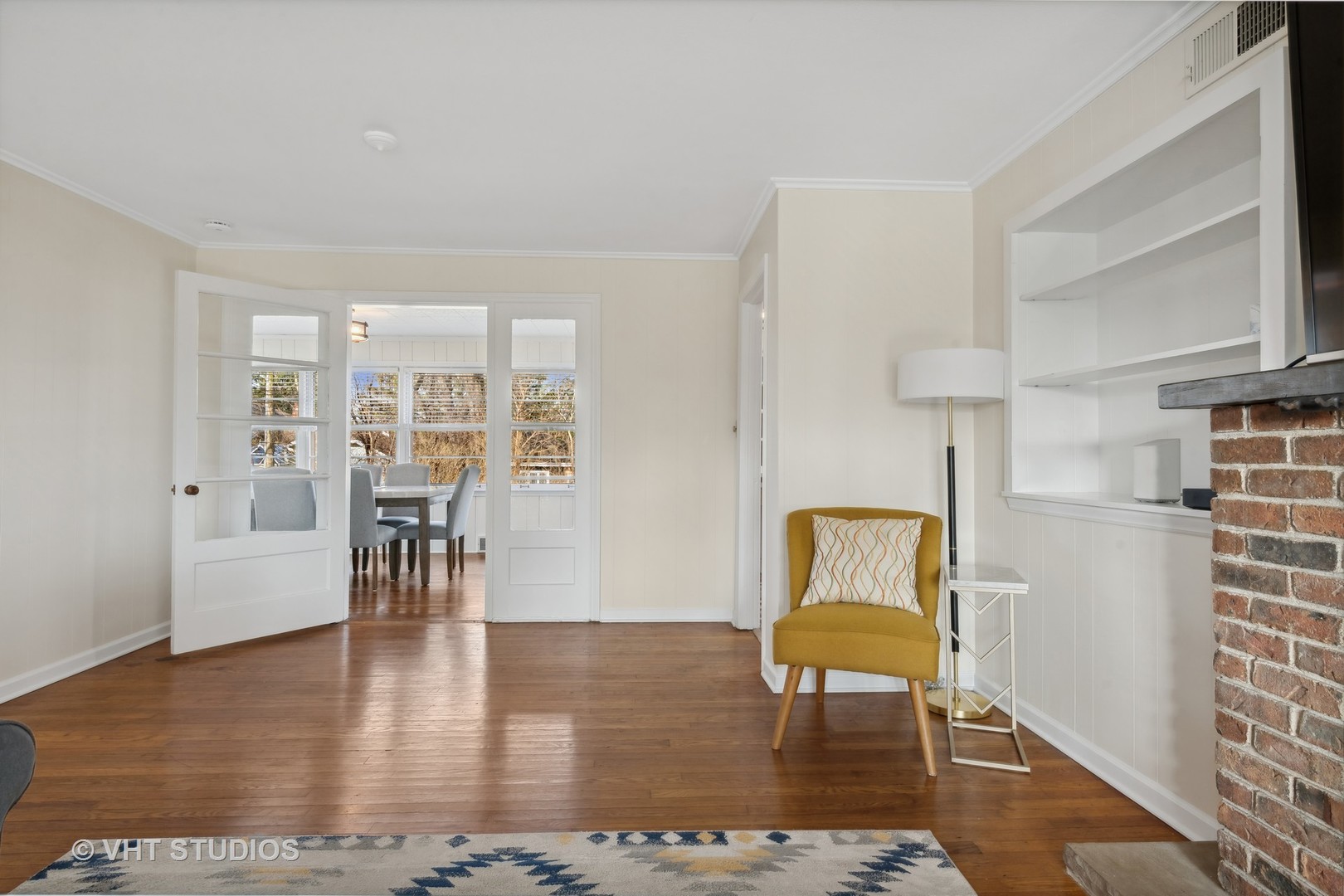 412 Warwick Road Tower Lakes, IL 60010 - Photo 4 of 30 a living room with furniture and a table