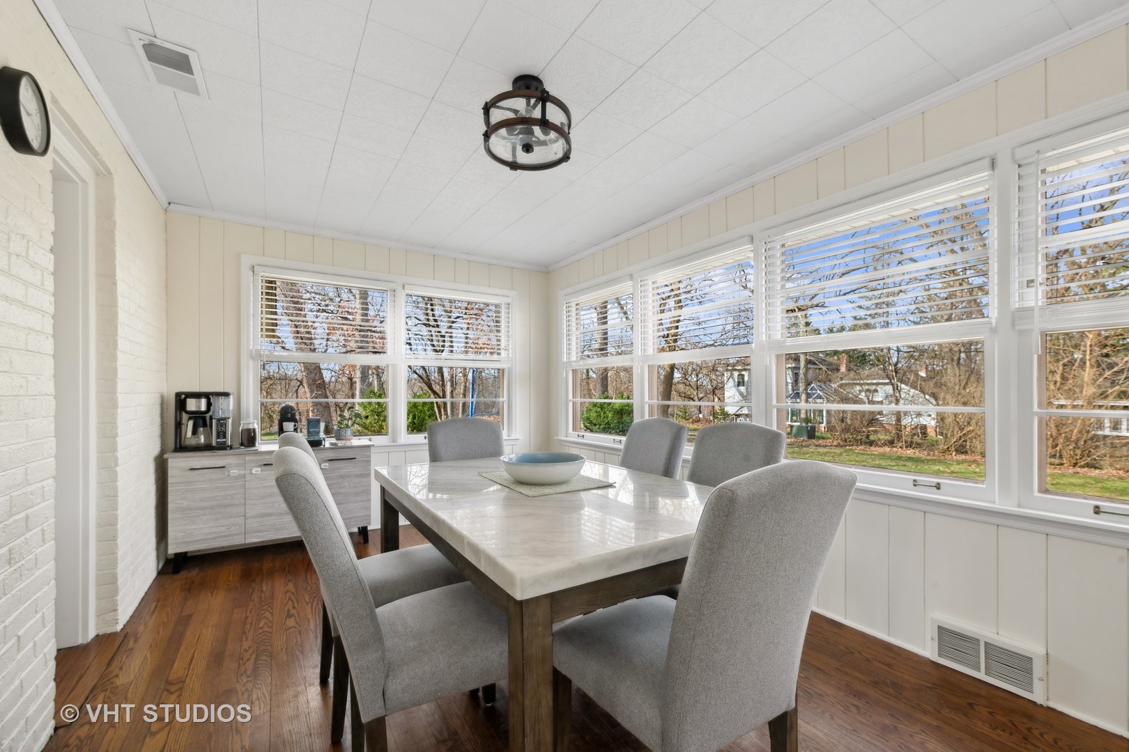 412 Warwick Road Tower Lakes, IL 60010 - Photo 8 of 30 a view of a dining room with furniture window and wooden floor