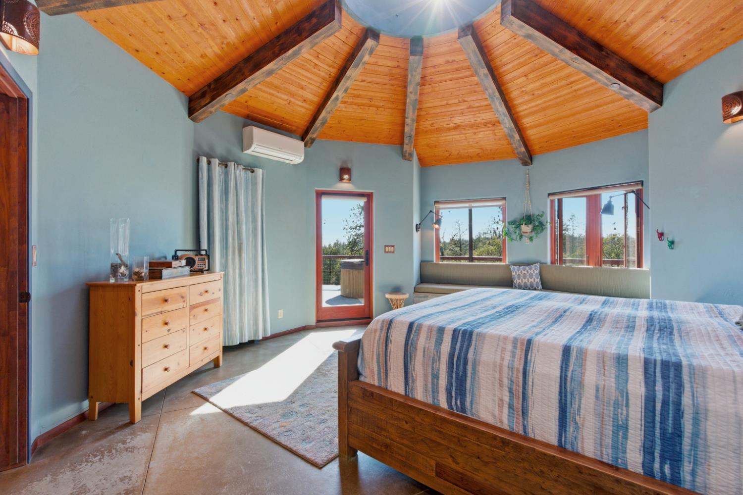 12767 Newtown Road Nevada City, CA 95959 - Photo 13 of 57 a bedroom with a bed and a dresser