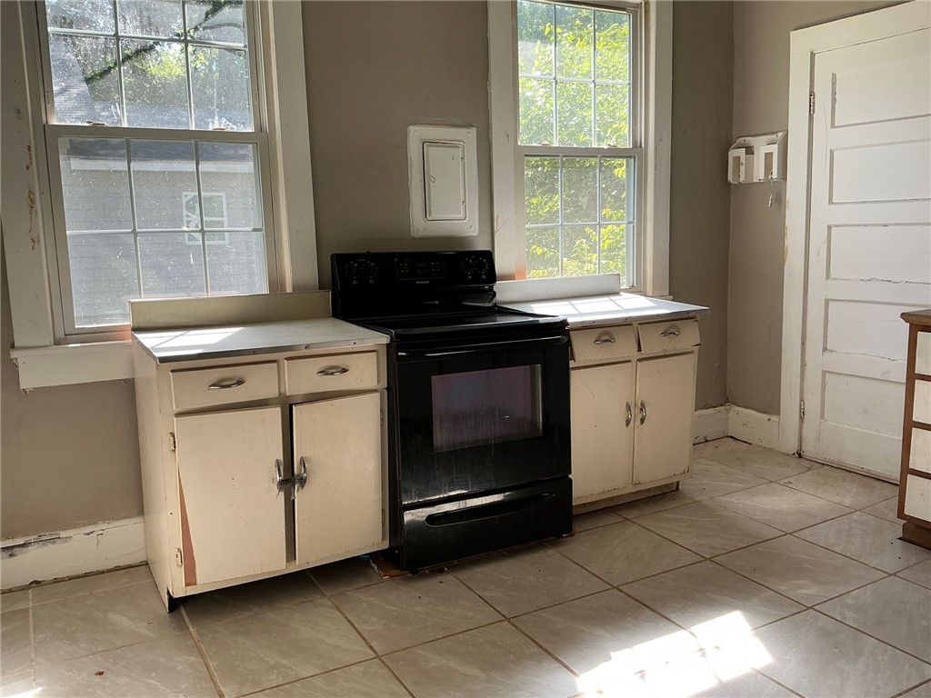 14 Ames Street Seneca, SC 29678 - Photo 14 of 15 This bright kitchen features ample natural light and a functional layout.
