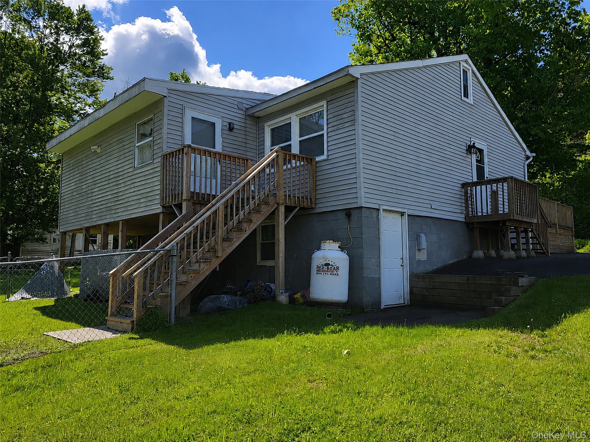 286 Dingle Daisy Road Monticello, NY 12701 - Photo 3 of 35 a front view of house with yard and green space