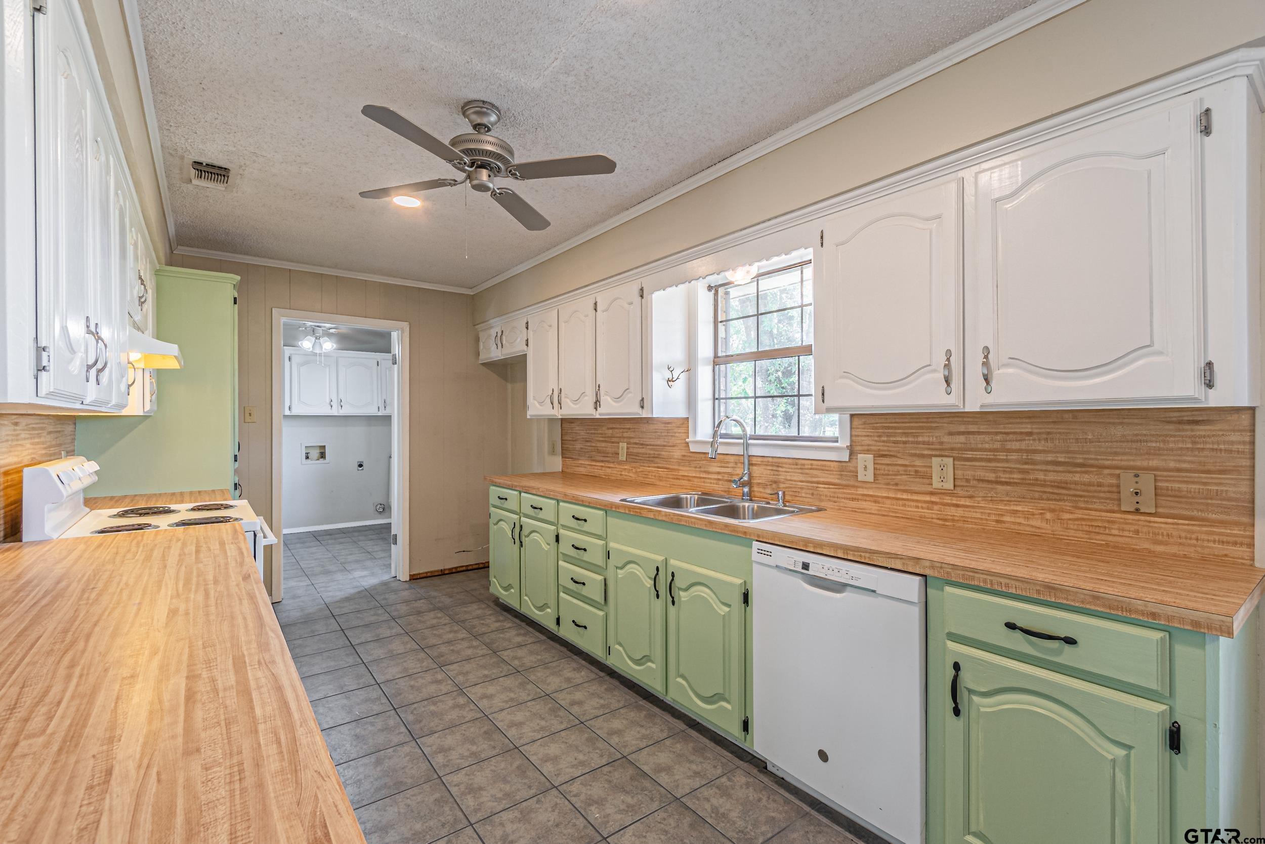 401 VZ County Road Canton, TX 75103 - Photo 11 of 45 a kitchen with stainless steel appliances granite countertop a sink and cabinets