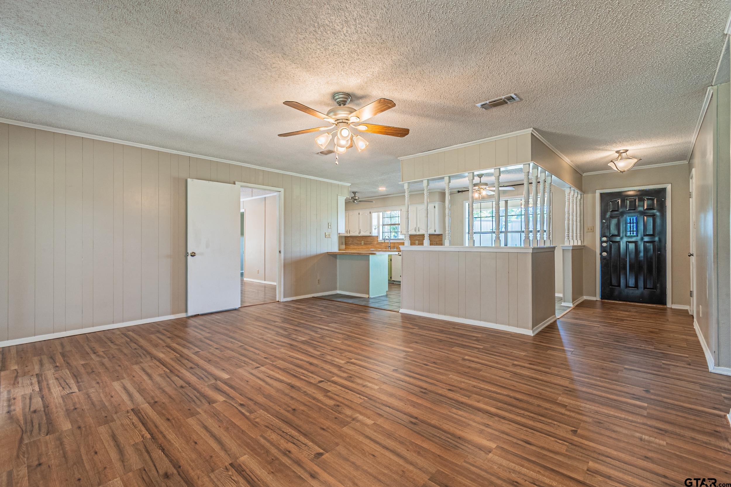 401 VZ County Road Canton, TX 75103 - Photo 22 of 45 a view of a kitchen with wooden floor and a kitchen