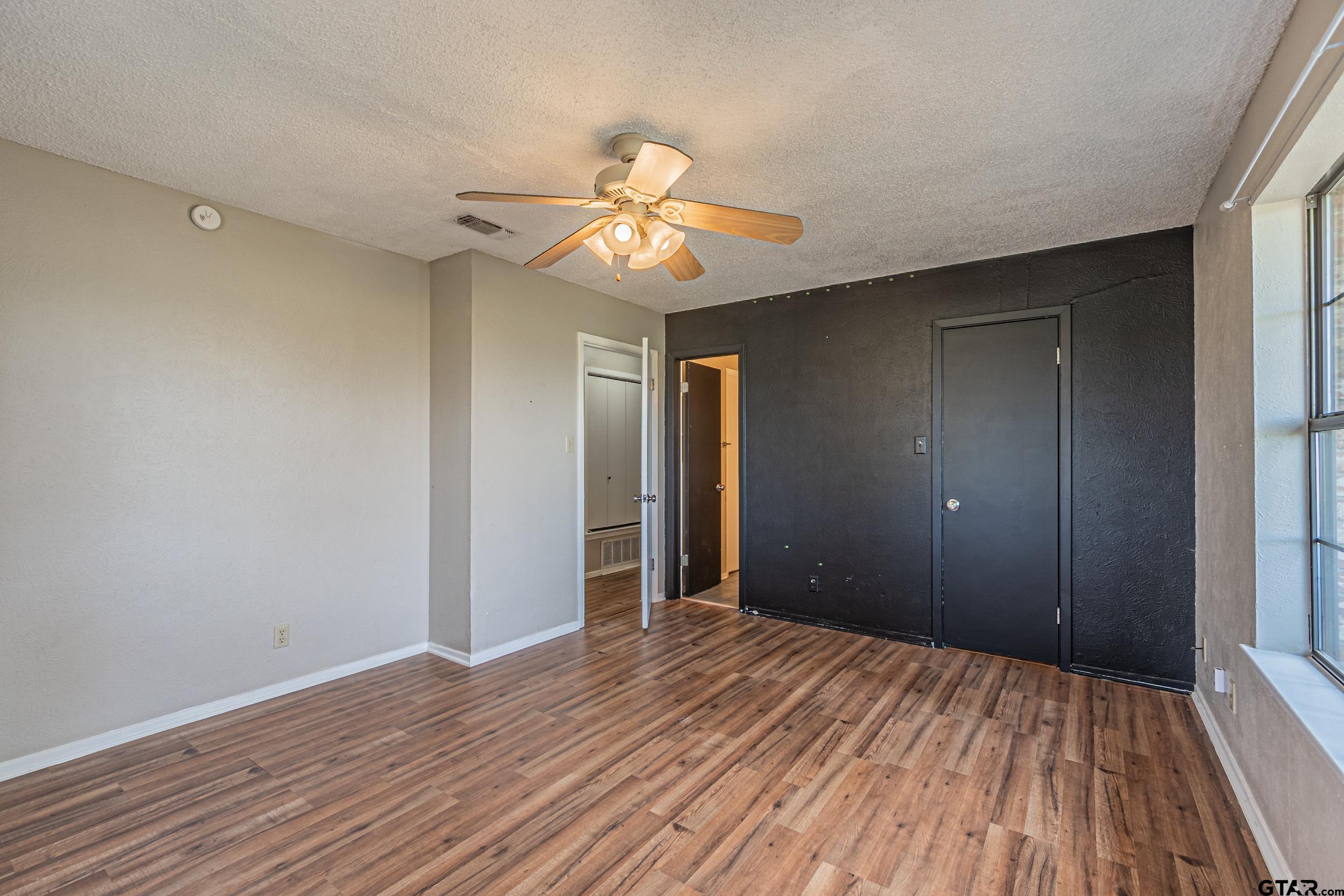 401 VZ County Road Canton, TX 75103 - Photo 31 of 45 a view of empty room with wooden floor