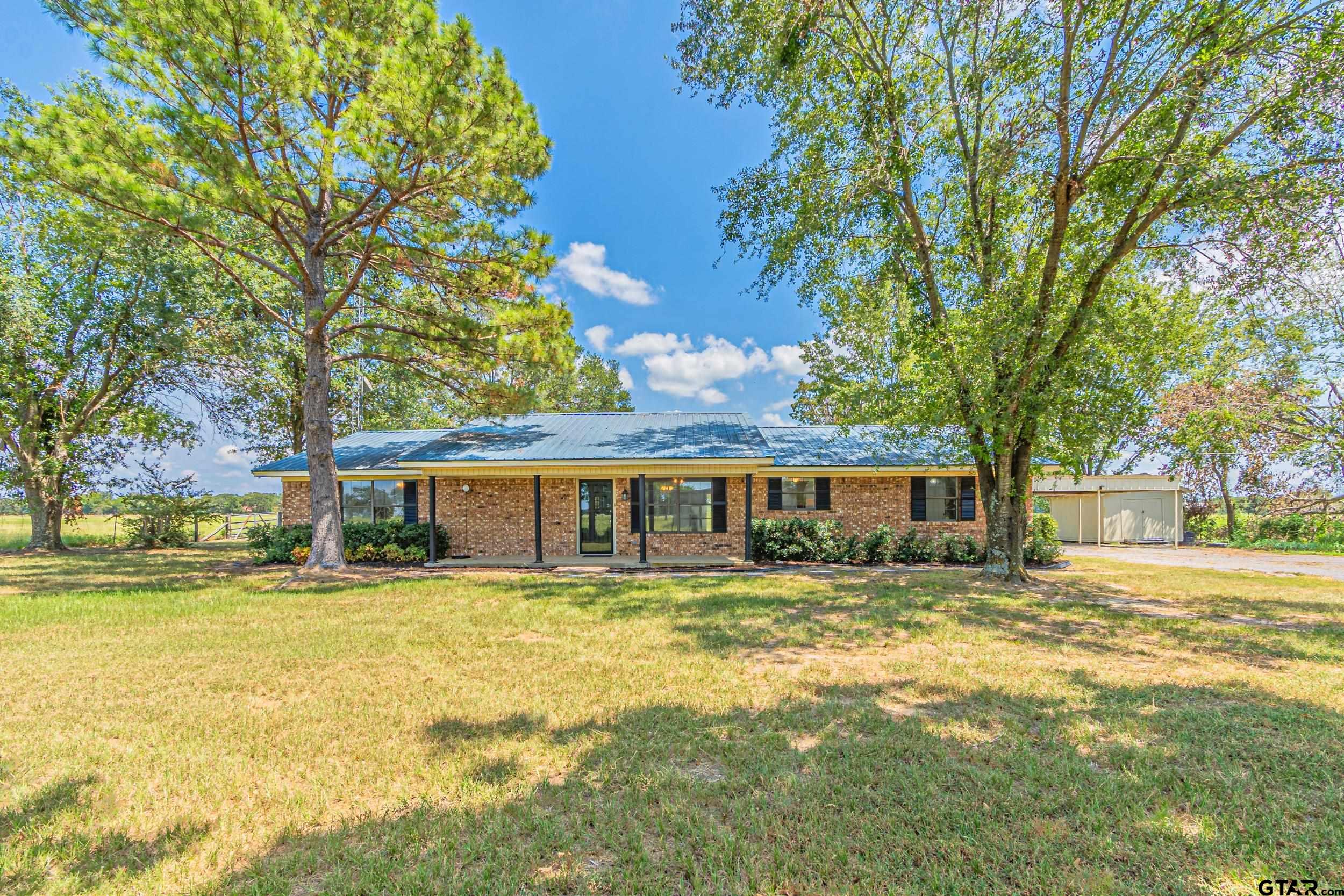 401 VZ County Road Canton, TX 75103 - Photo 6 of 45 a view of a house with a yard and large trees