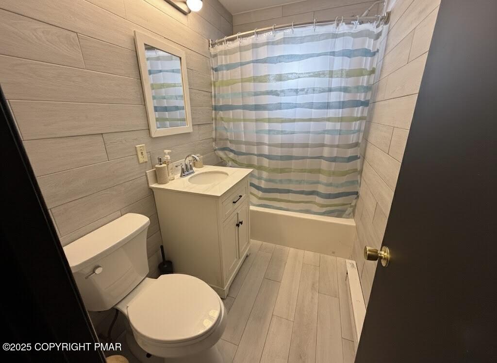 1215 Steele Circle Bushkill, PA 18324 - Photo 12 of 13 a white toilet sitting next to a bathroom sink