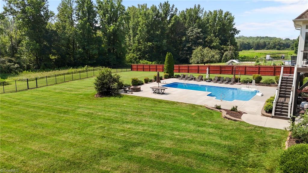 5822 Crutchfield Farm Road Oak Ridge, NC 27310 - Photo 14 of 47 Level yard with privacy fence on each side