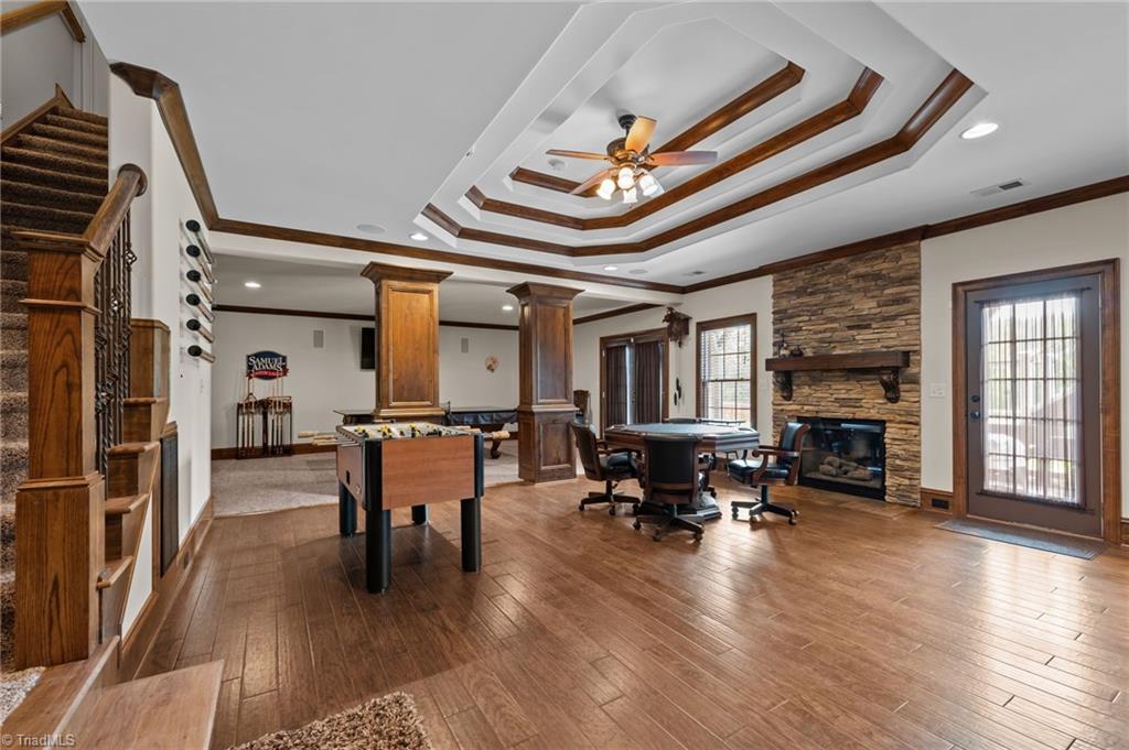 5822 Crutchfield Farm Road Oak Ridge, NC 27310 - Photo 36 of 47 An entertainer's dream walk-out basement! Media area, game area, full bar, extra flex room and full bathroom with urinal, shower, and industrial hand dyer.