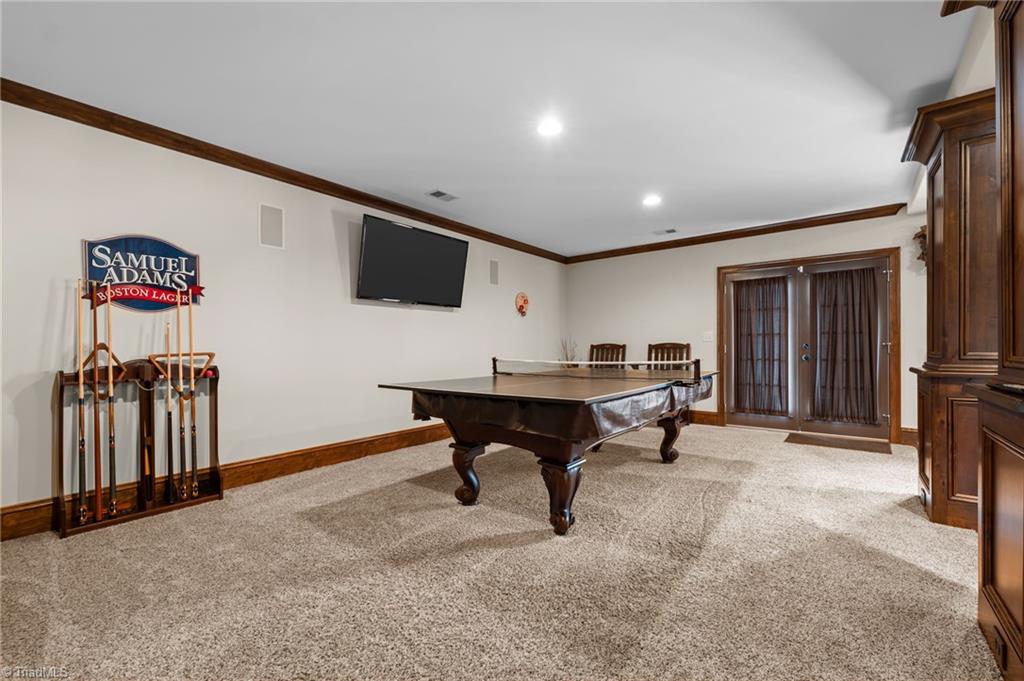 5822 Crutchfield Farm Road Oak Ridge, NC 27310 - Photo 40 of 47 Media area in basement