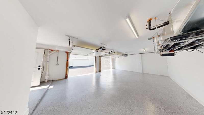 376 5th Avenue Paterson, NJ 07514 - Photo 14 of 20 a view of a livingroom with wooden floor and white walls