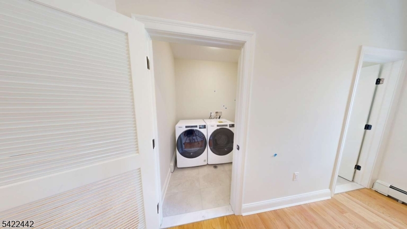 376 5th Avenue Paterson, NJ 07514 - Photo 8 of 20 a utility room with dryer and washer