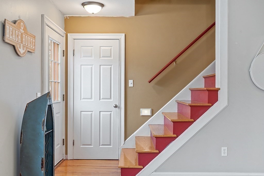 311 High Street Hampton, NH 03842 - Photo 12 of 21 a view of entryway and hall with wooden floor