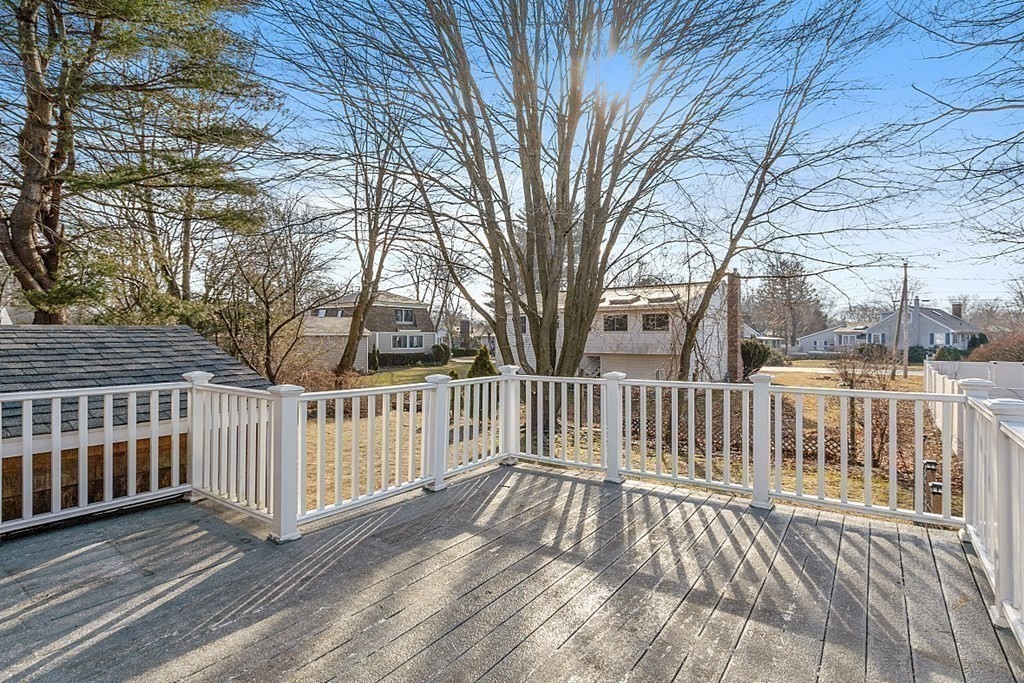 311 High Street Hampton, NH 03842 - Photo 4 of 21 a view of a wooden roof deck