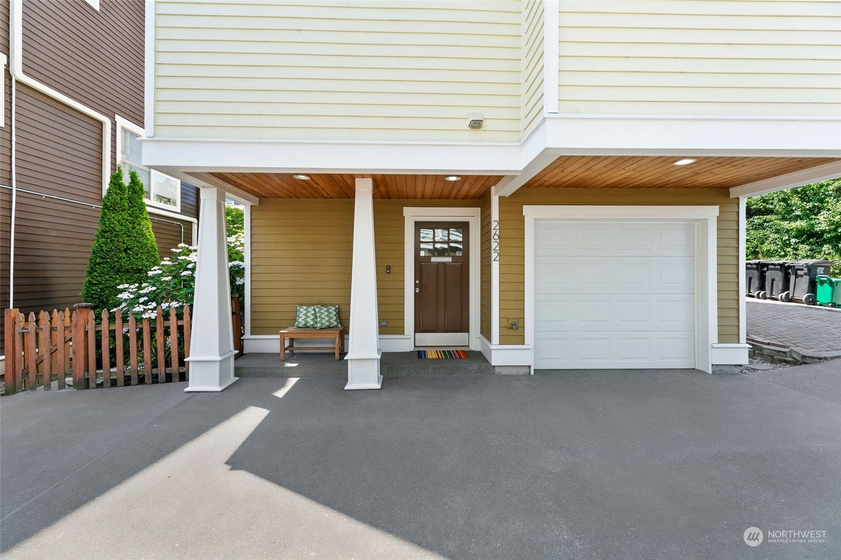 an entrance view of a house with porch