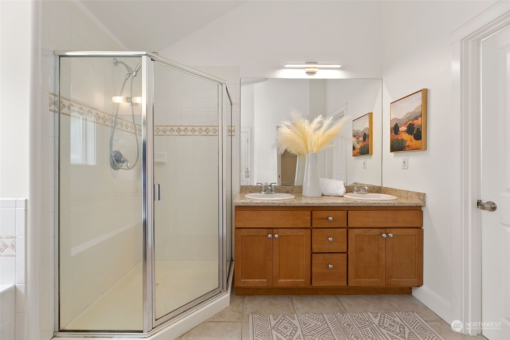 2622 East Union Street Seattle, WA 98122 - Photo 20 of 30 a bathroom with a double vanity sink mirror and