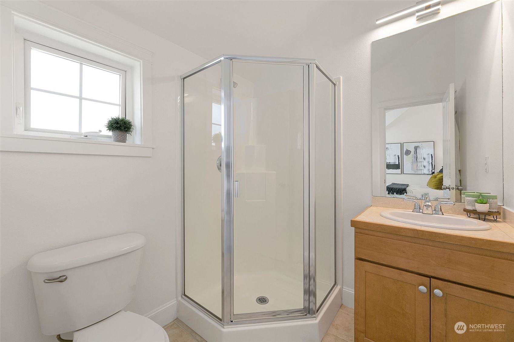 2622 East Union Street Seattle, WA 98122 - Photo 21 of 30 a bathroom with a sink a toilet and shower