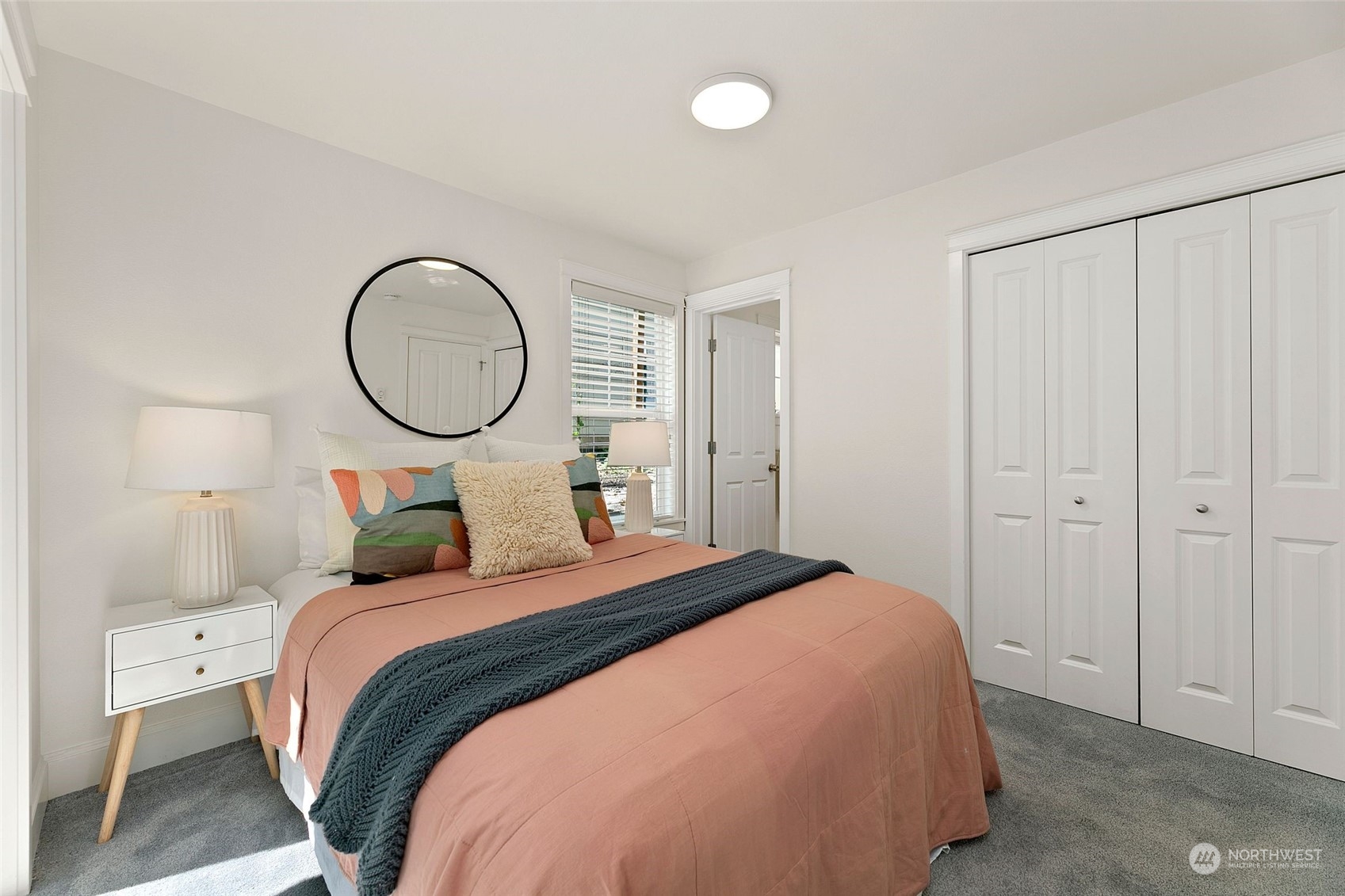 2622 East Union Street Seattle, WA 98122 - Photo 23 of 30 a bedroom with a bed and a closet