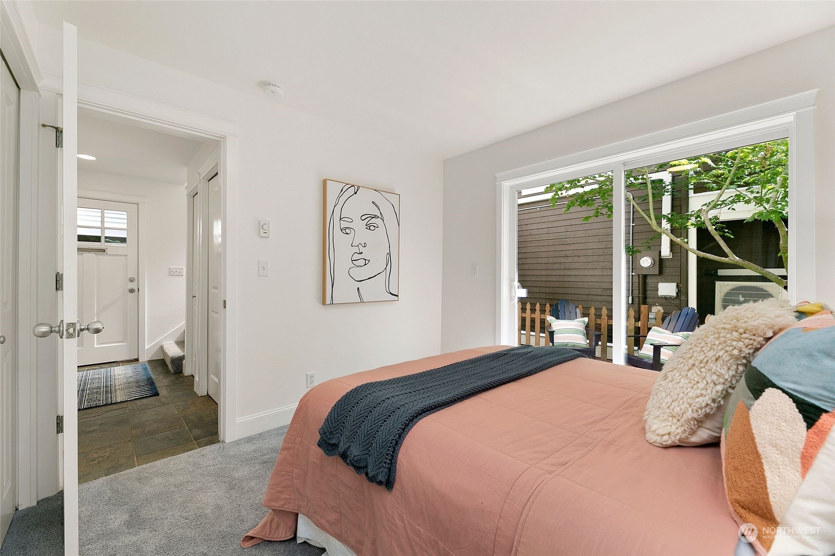 2622 East Union Street Seattle, WA 98122 - Photo 24 of 30 a bedroom with a bed and a large window