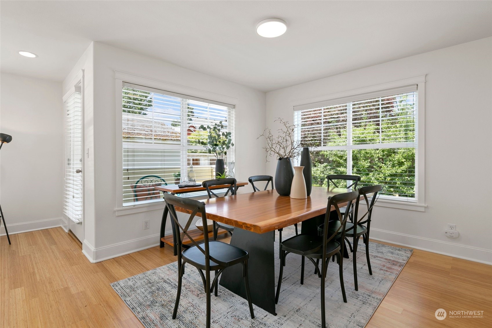 2622 East Union Street Seattle, WA 98122 - Photo 3 of 30 a view of a dining room with furniture and wooden floor