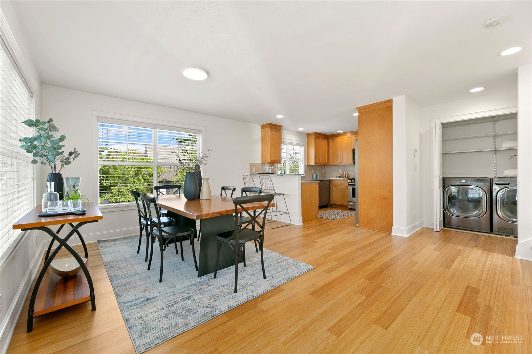 2622 East Union Street Seattle, WA 98122 - Photo 4 of 30 a view of a dining room with furniture and wooden floor