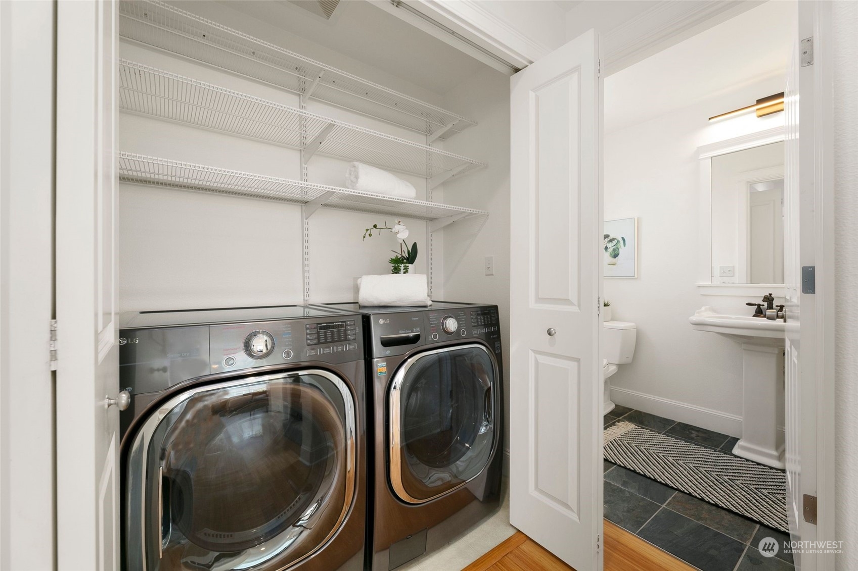 2622 East Union Street Seattle, WA 98122 - Photo 10 of 30 a utility room with sink dryer and washer