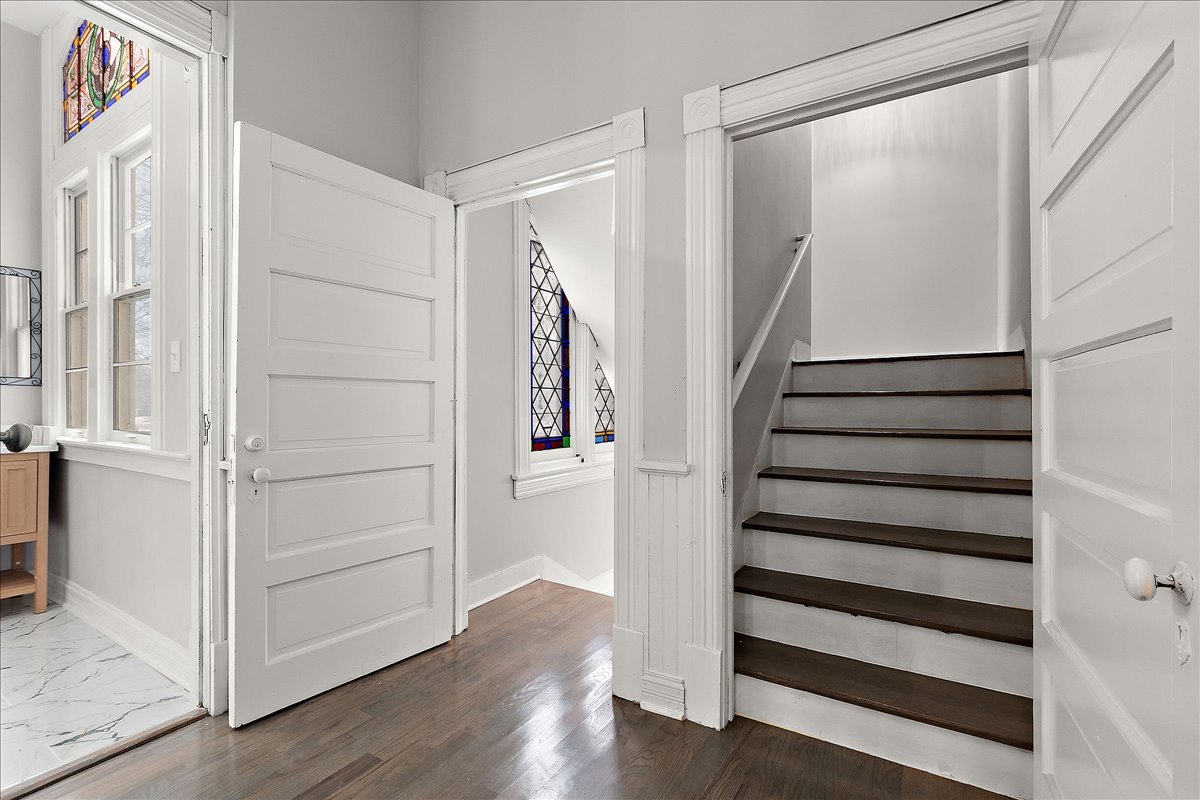 200 West Crawford Street Peotone, IL 60468 - Photo 23 of 42 a view of a hallway with wooden floor and entryway