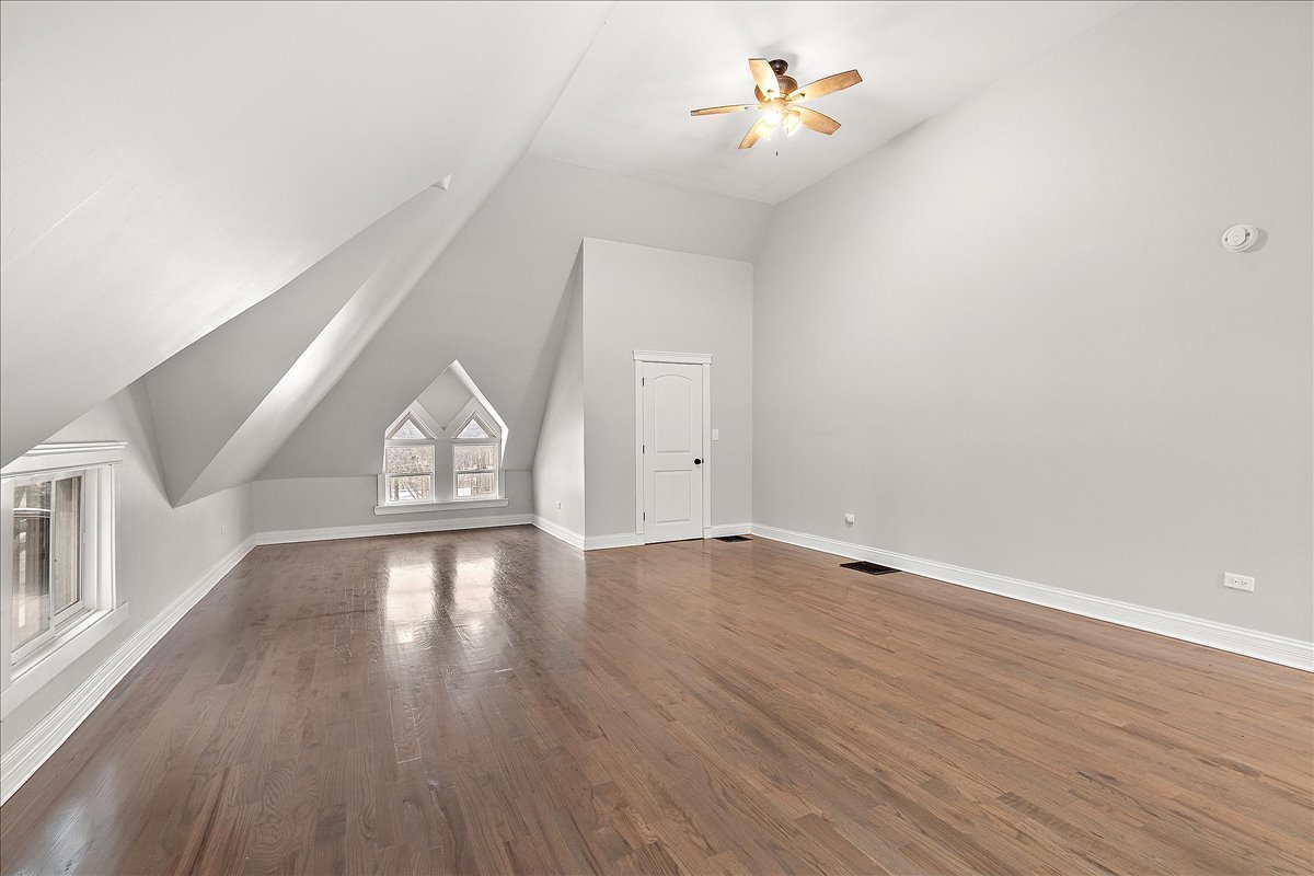 200 West Crawford Street Peotone, IL 60468 - Photo 25 of 42 wooden floor in an empty room with a window