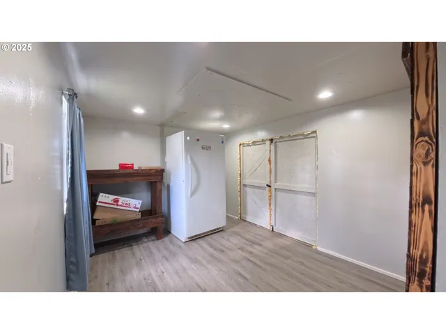 a room with furniture and window