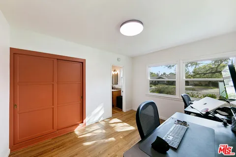 an aerial view of house with a swimming pool outdoor seating and entertaining space
