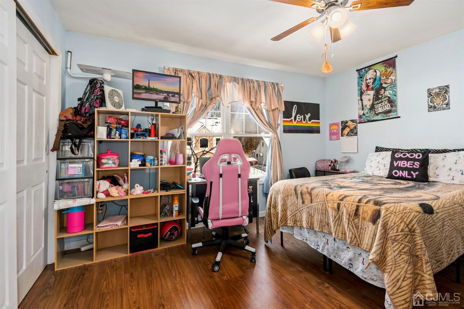 52 Caldwell Road Edison, NJ 08817 - Photo 11 of 17 a bedroom with bed and a bookshelf