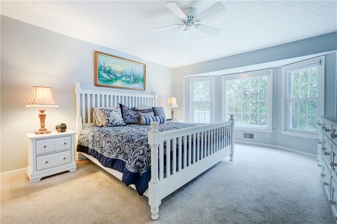 89 Creek Ridge Pittsford, NY 14534 - Photo 10 of 24 1st Floor Primary Bedroom With Private Bathroom