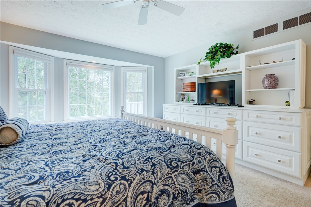 89 Creek Ridge Pittsford, NY 14534 - Photo 11 of 24 1st Floor Primary Bedroom With Private Bathroom