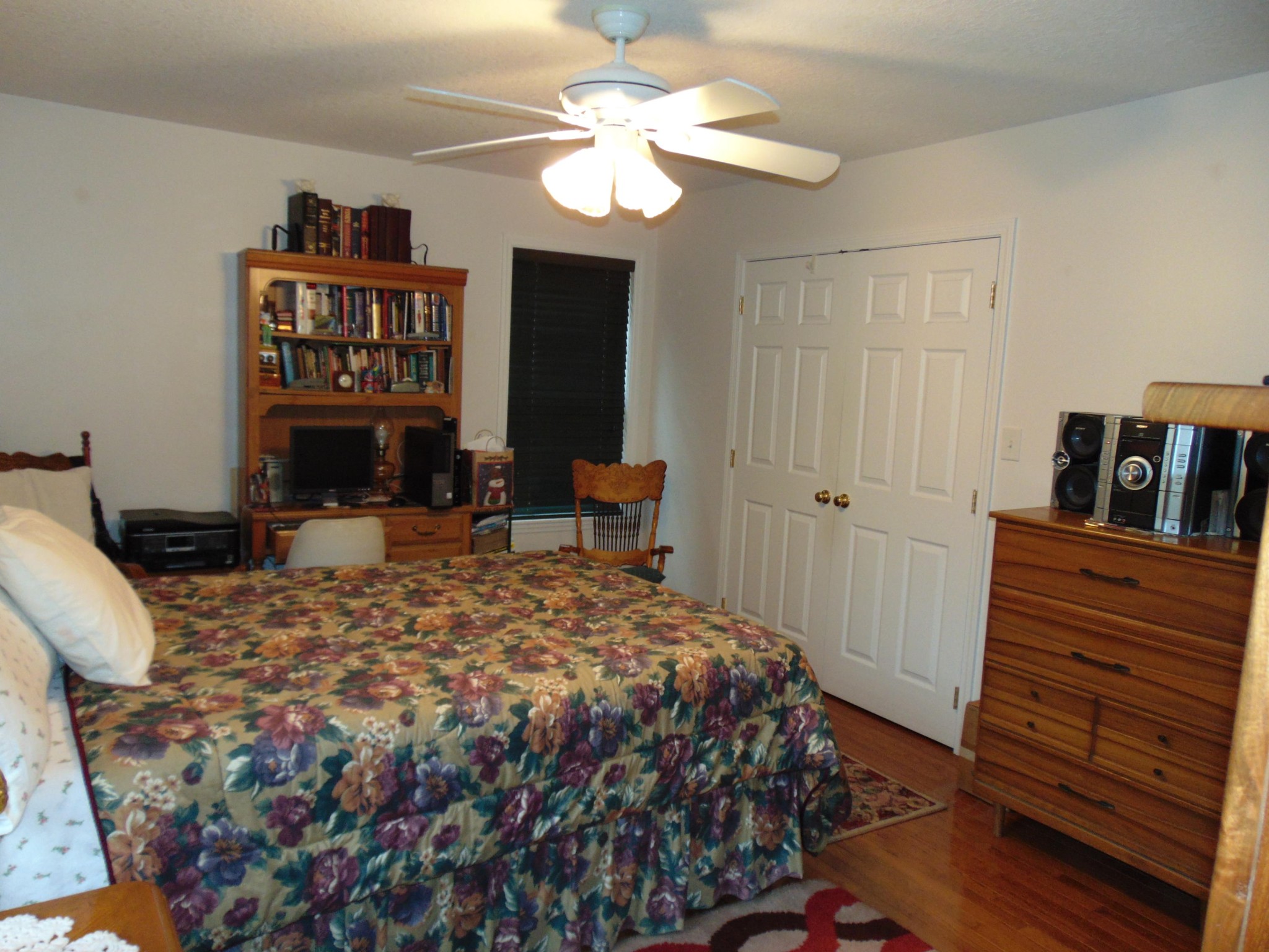 4019 Decatur Highway Kingston, TN 37763 - Photo 9 of 13 a bedroom with a bed and a bookshelf