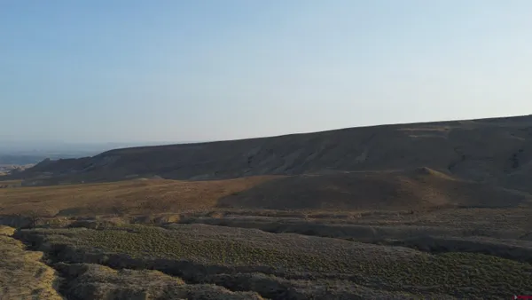 a view of city and mountain