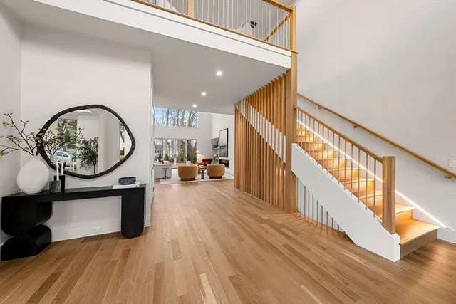 a view of living room with furniture and a fireplace
