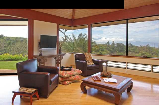 1390 Kokomo Road Haiku, HI 96708 - Photo 14 of 30 a living room with furniture and a large window
