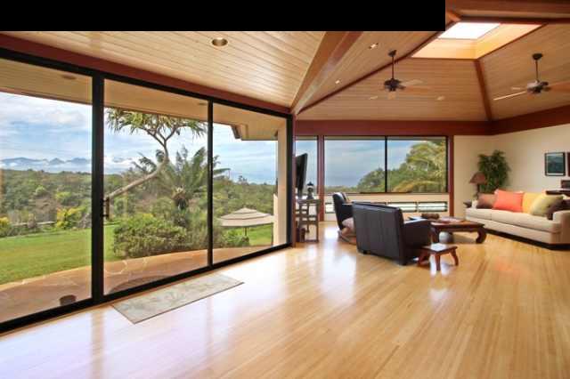 1390 Kokomo Road Haiku, HI 96708 - Photo 3 of 30 a living room filled with furniture and a large window