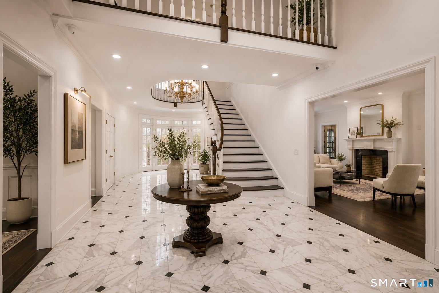 333 Rock Rimmon Road Stamford, CT 06903 - Photo 6 of 40 Wonderful first impression, soaring ceilings, waterfall stairway.