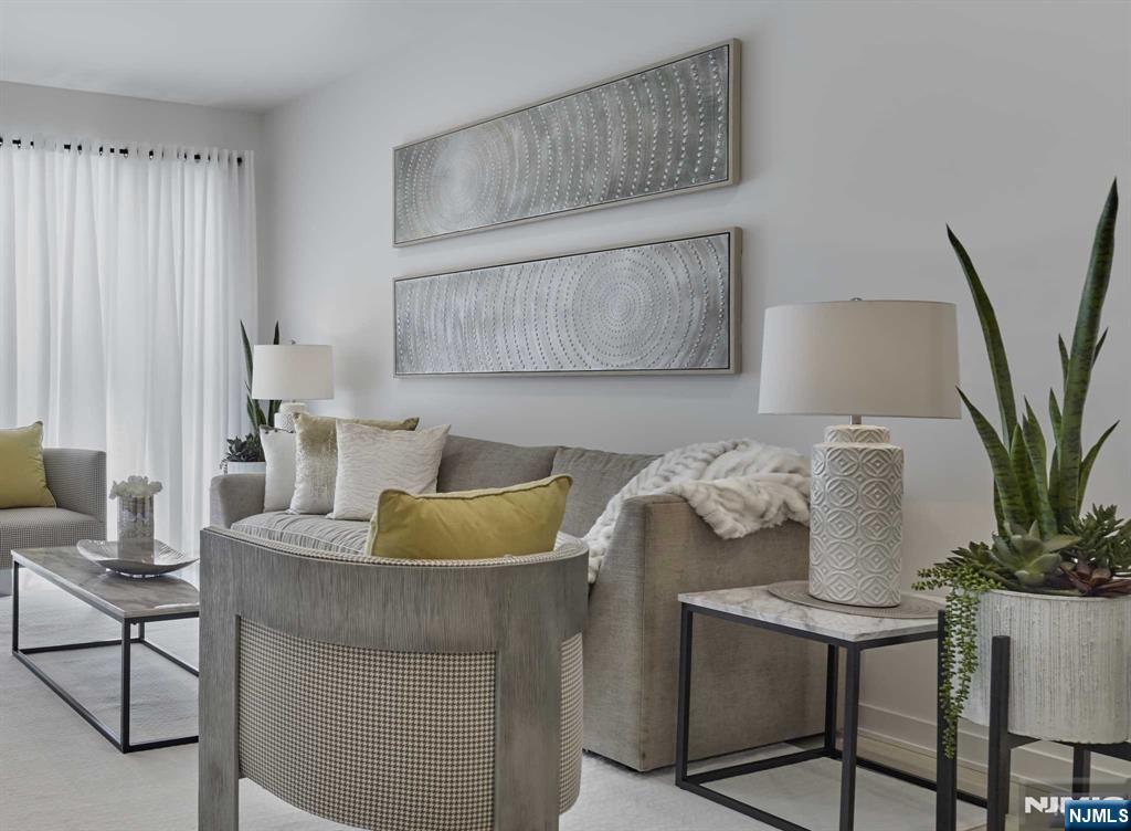 8 Tice Road, Unit 318 Franklin Lakes, NJ 07417 - Photo 13 of 29 a living room with furniture and a potted plant