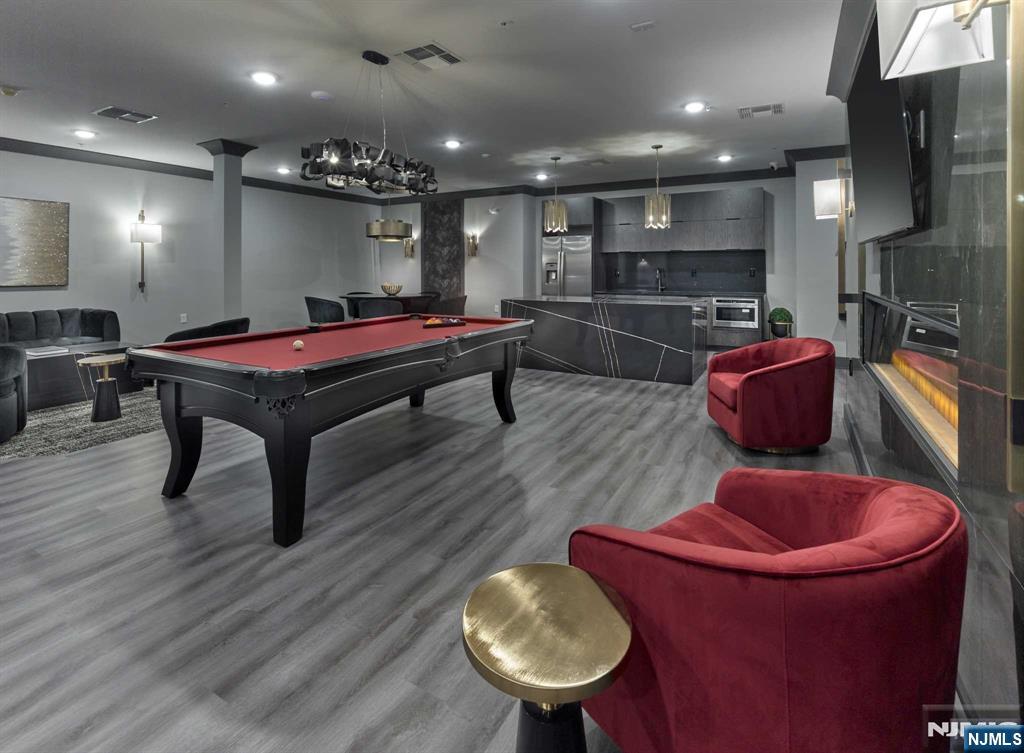 8 Tice Road, Unit 318 Franklin Lakes, NJ 07417 - Photo 25 of 29 a room with furniture and pool table