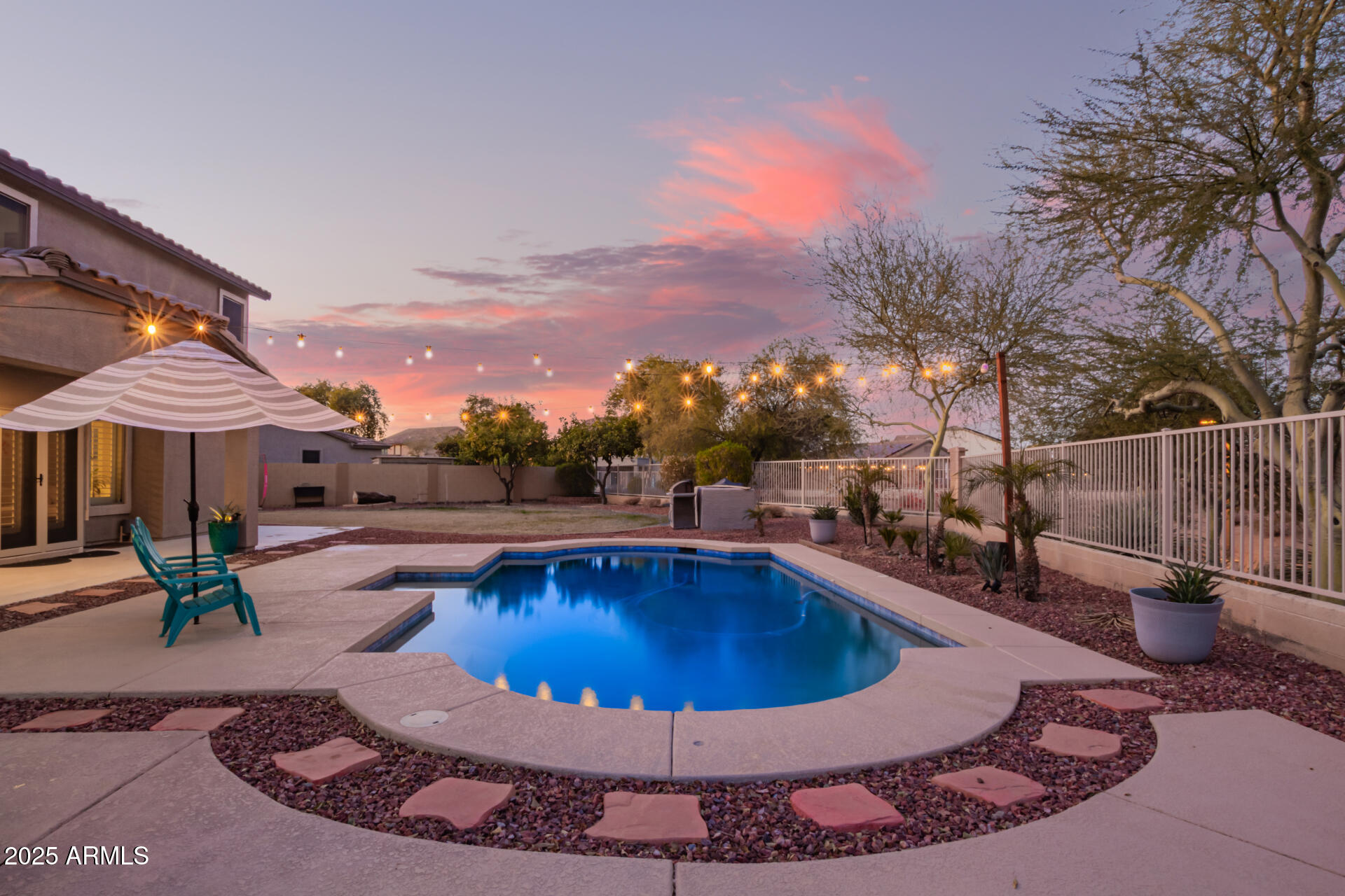2921 South Martingale Road Gilbert, AZ 85295 - Photo 54 of 67 a view of a swimming pool with sitting area