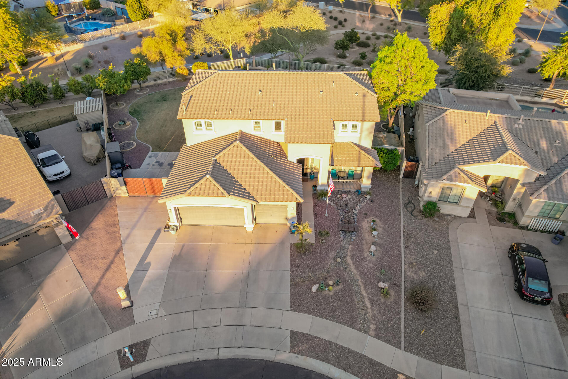 2921 South Martingale Road Gilbert, AZ 85295 - Photo 8 of 67 an aerial view of a house with a swimming pool