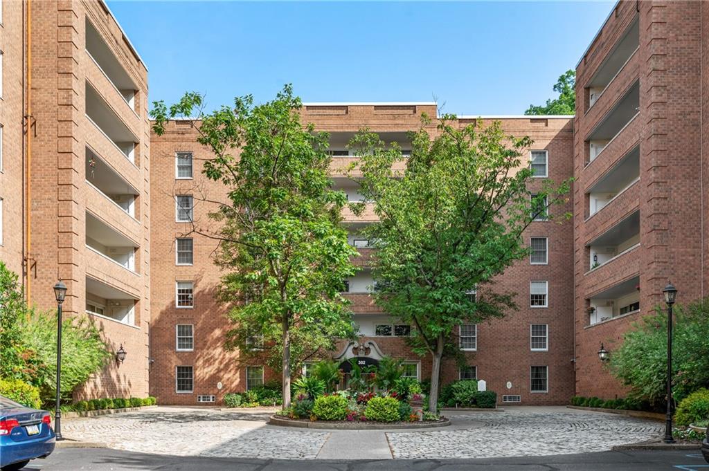 302 Fox Chapel Road, Unit 401 Pittsburgh, PA 15238 - Photo 1 of 25 a view of a building