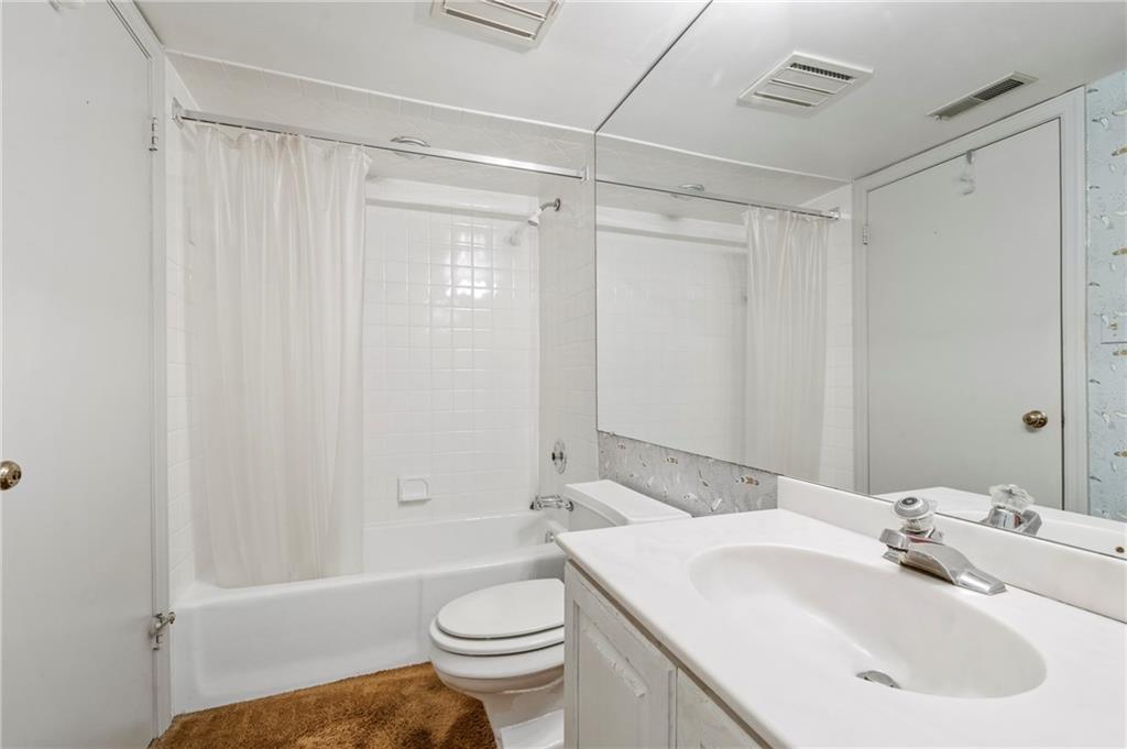 302 Fox Chapel Road, Unit 401 Pittsburgh, PA 15238 - Photo 14 of 25 a bathroom with a sink toilet and shower