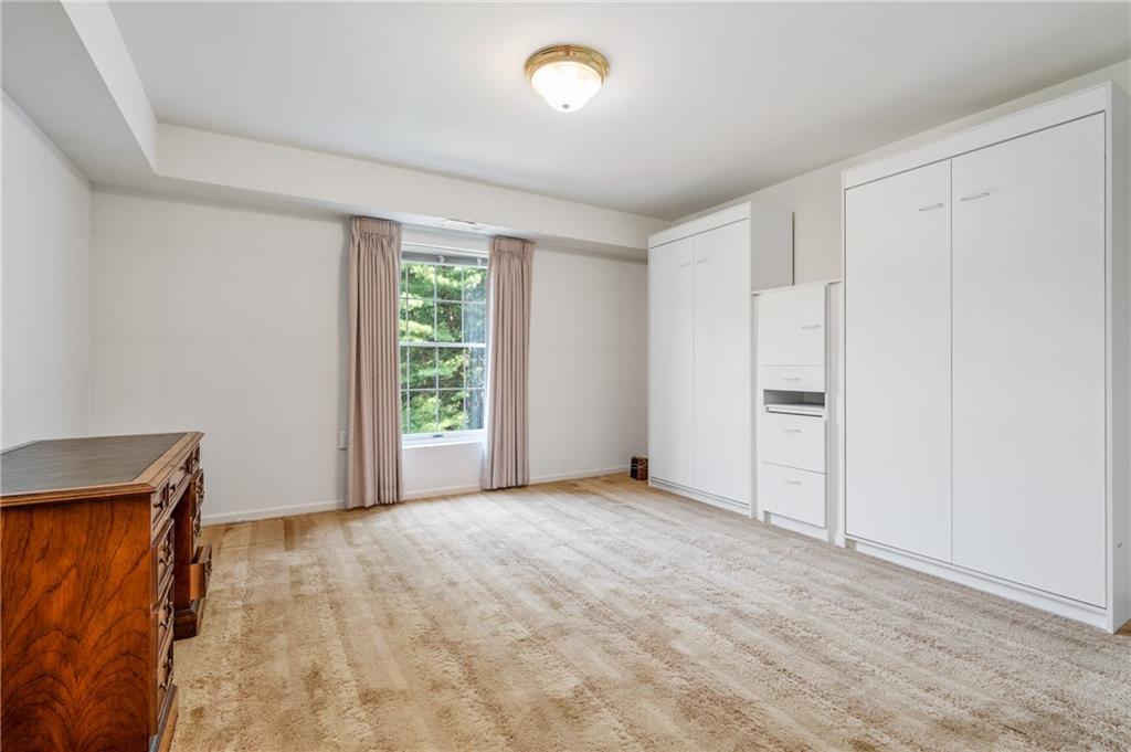 302 Fox Chapel Road, Unit 401 Pittsburgh, PA 15238 - Photo 15 of 25 a view of an empty room with a window