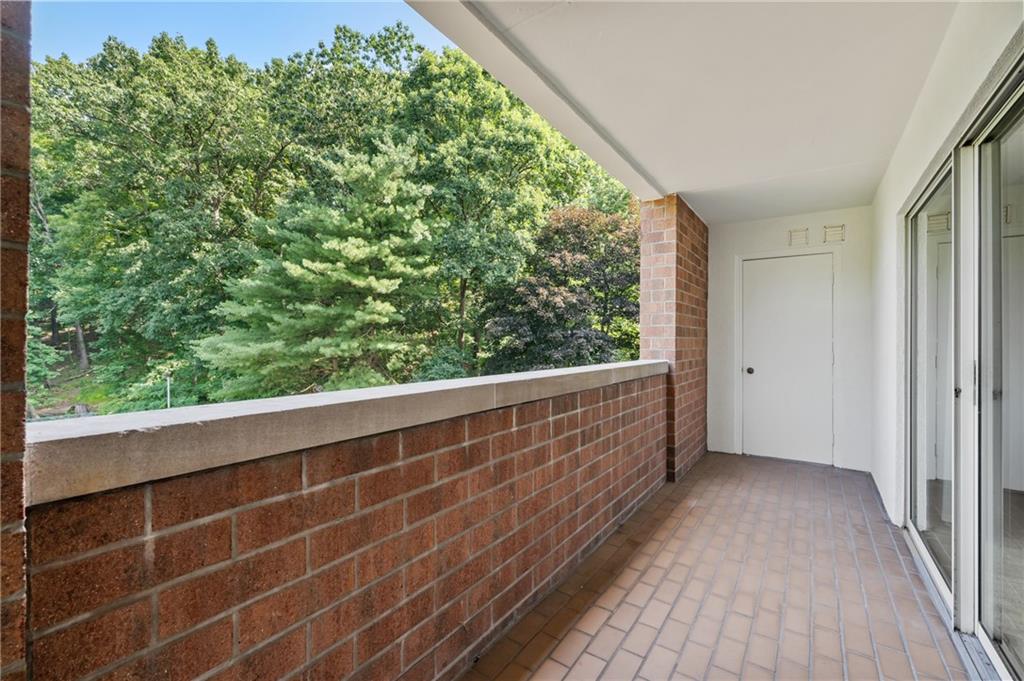 302 Fox Chapel Road, Unit 401 Pittsburgh, PA 15238 - Photo 19 of 25 a view of balcony with wooden floor