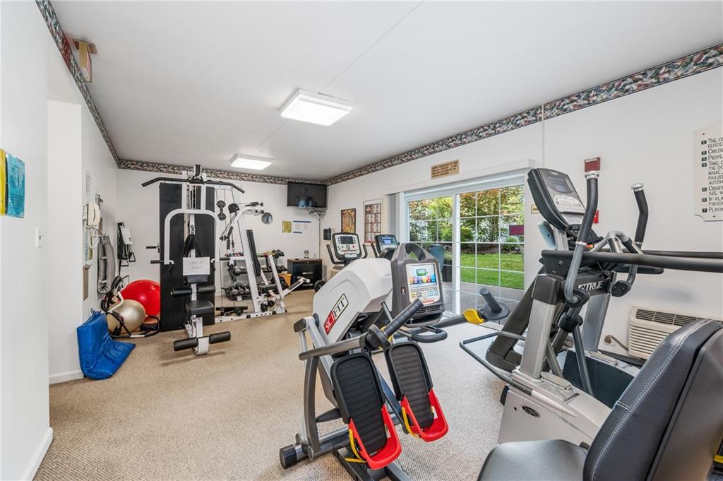 302 Fox Chapel Road, Unit 401 Pittsburgh, PA 15238 - Photo 23 of 25 a view of a room with gym equipment