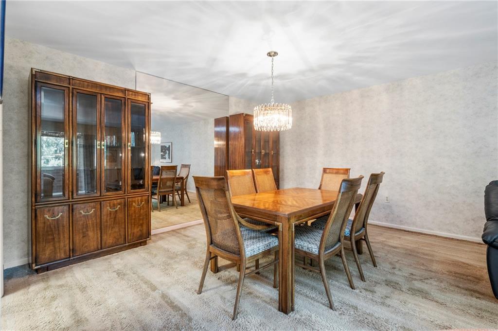 302 Fox Chapel Road, Unit 401 Pittsburgh, PA 15238 - Photo 10 of 25 a view of a dining room with furniture