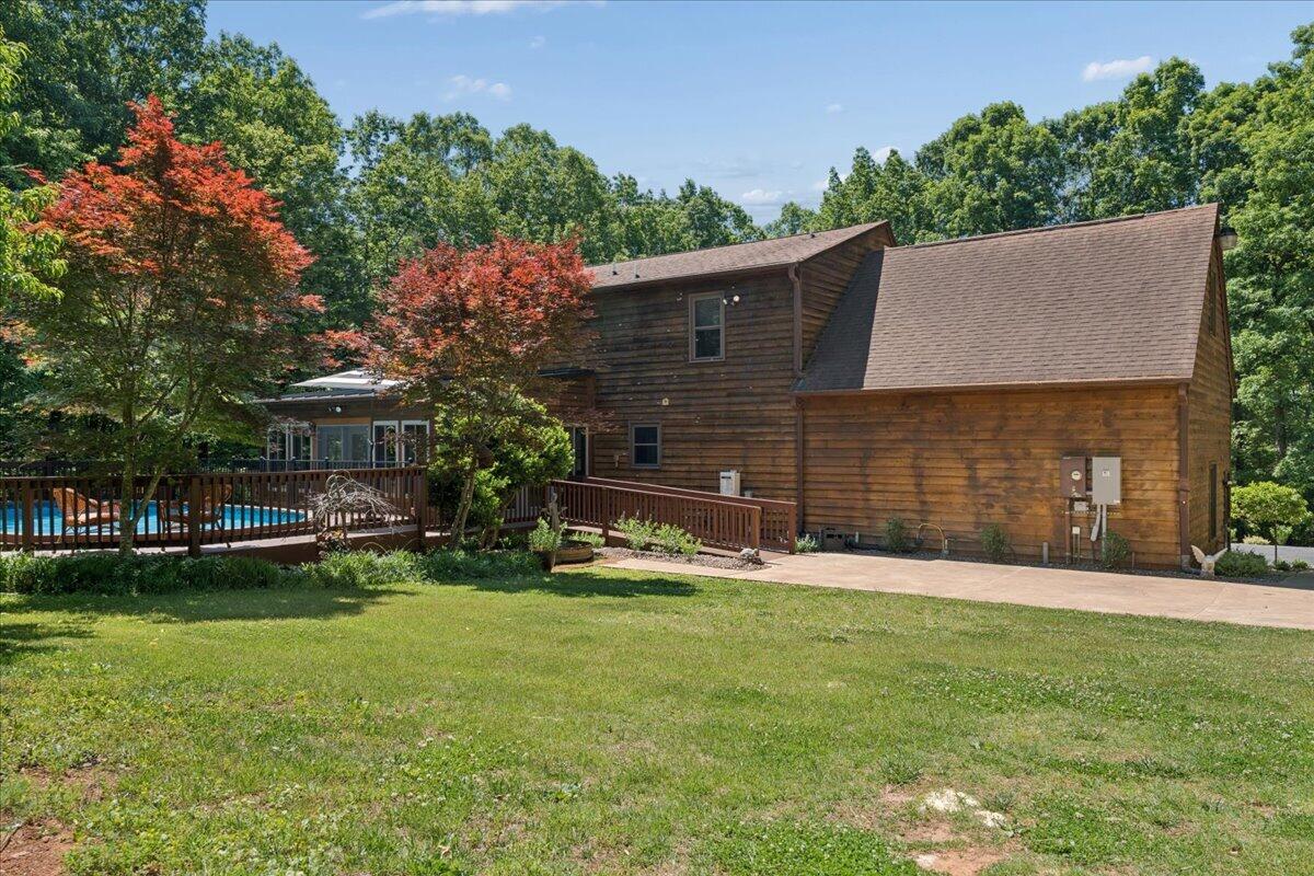 431 Langdon Road Evington, VA 24550 - Photo 38 of 54 a front view of a house with a yard and trees