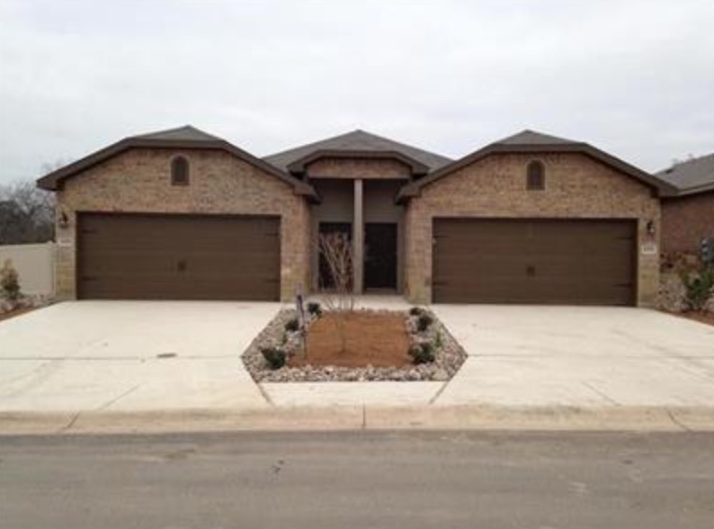a front view of a house with entertaining space